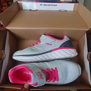 Little girls Fila running shoes.